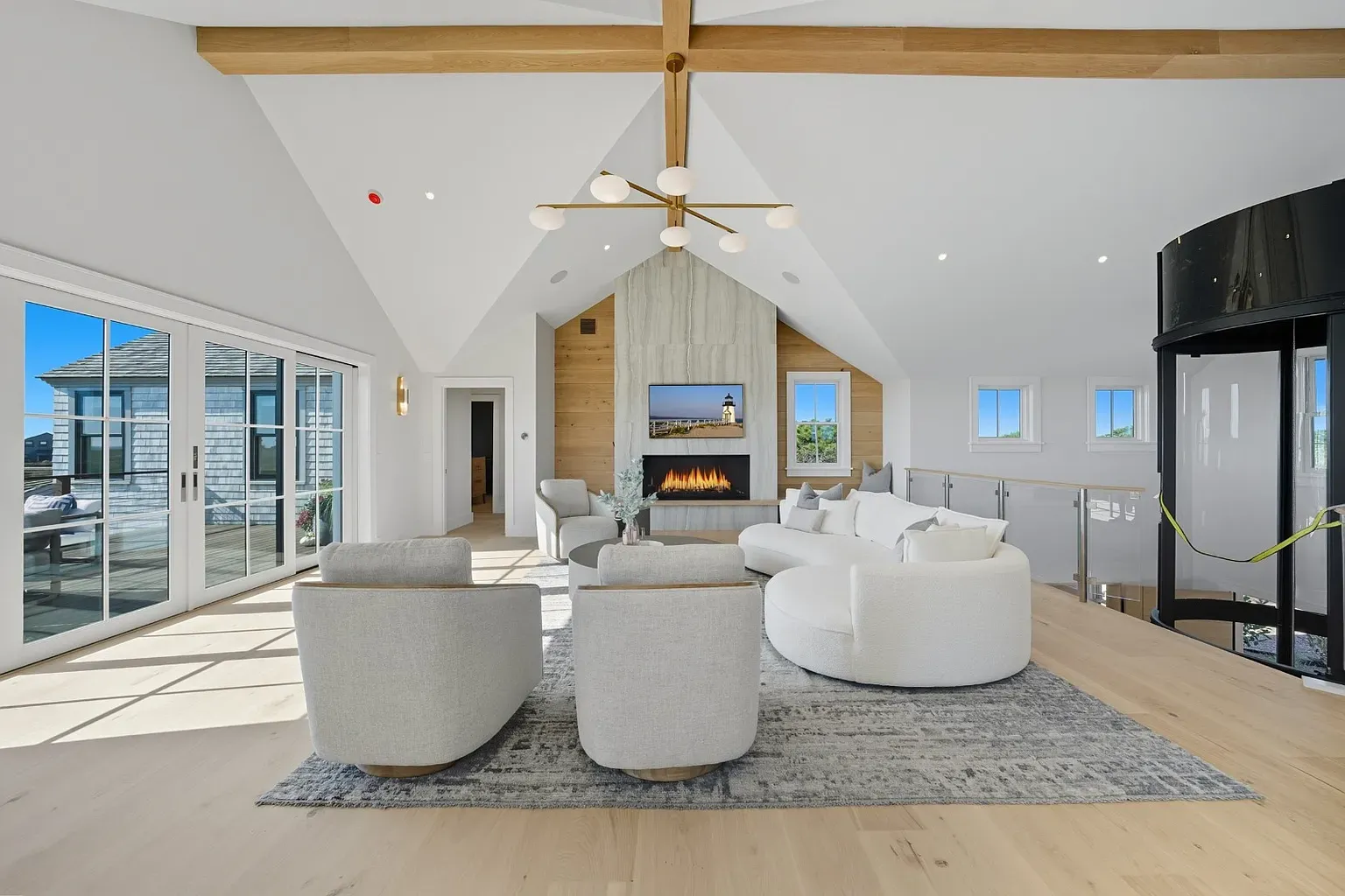 Okay, these beams. Vaulted ceiling really makes the room breathe.