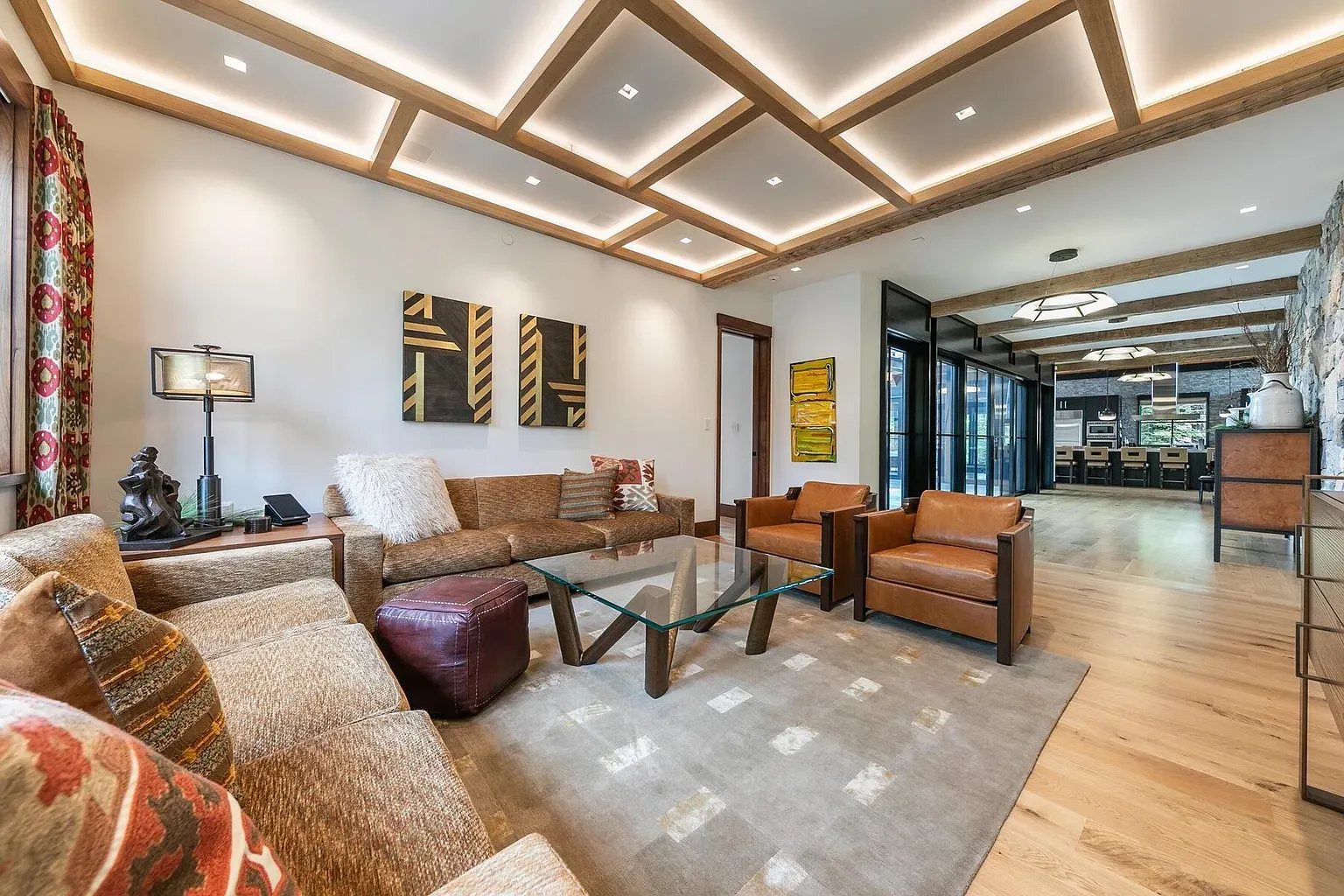 Oversized sectional calling naps. Leather chairs look they actually get used.