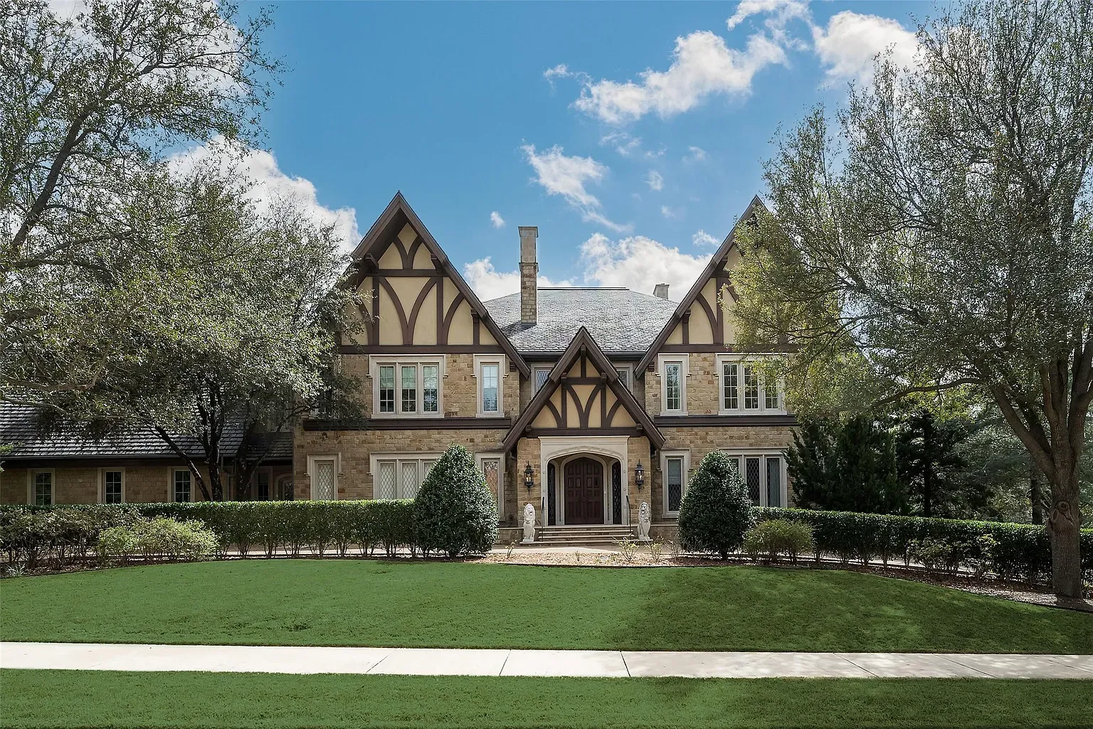 Tudor front with real stone and heavy beams. Looks straight out of a storybook.
