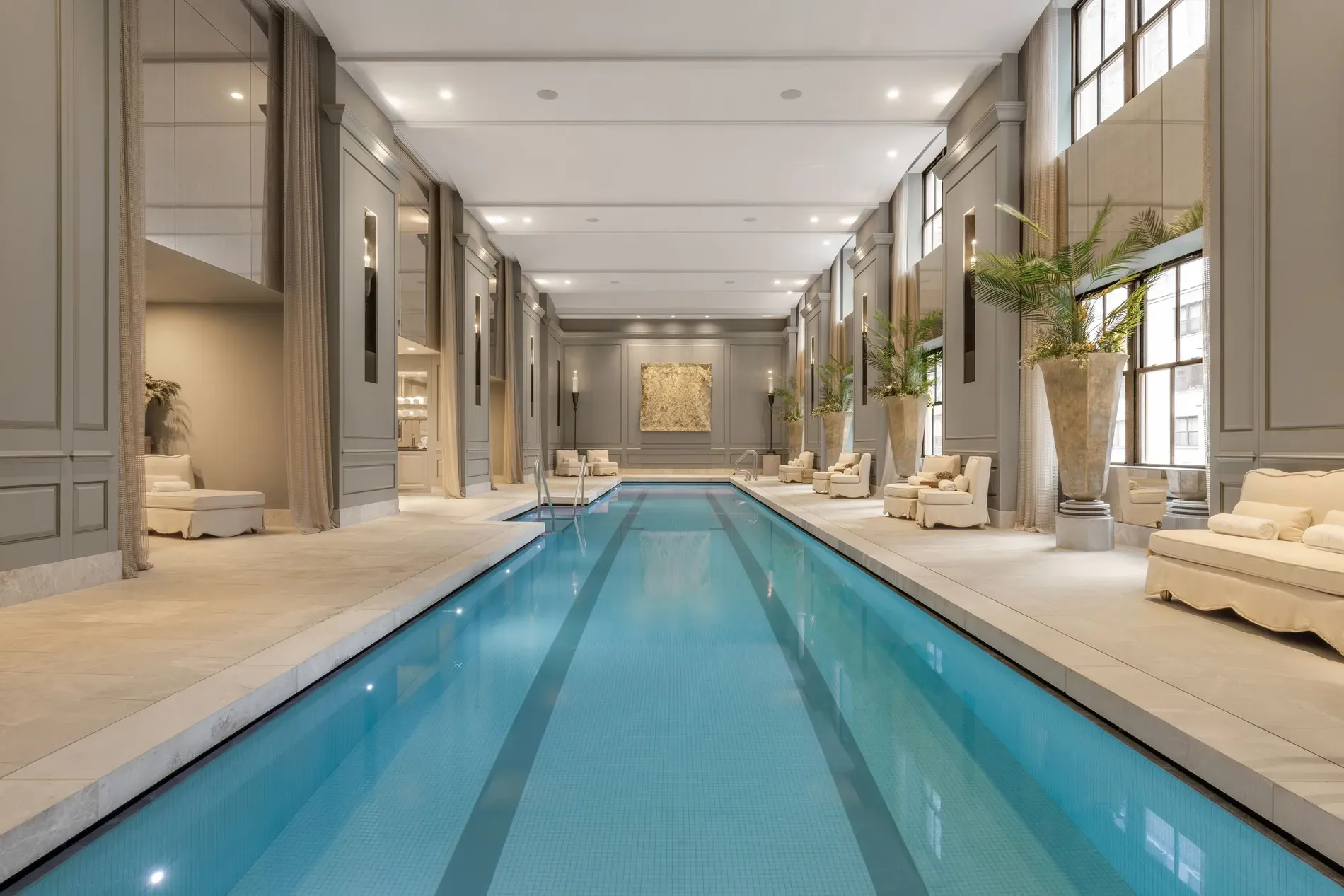 Pool looks serene — blue tiles, glass walls. Echoey in here?
