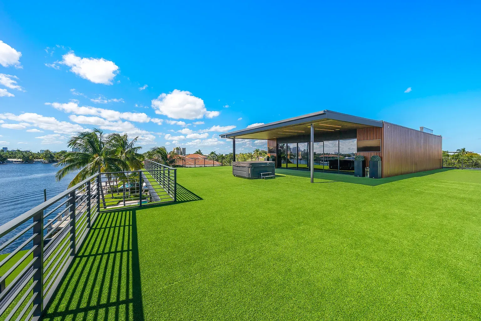 Rooftop putting-green vibes, but make it loungey.