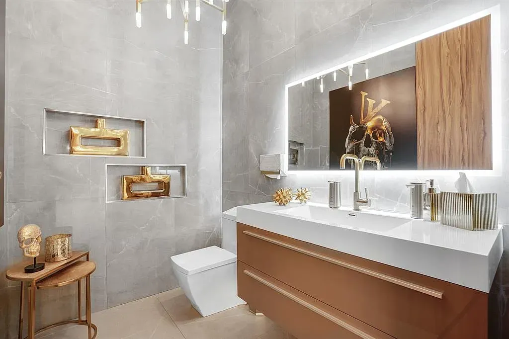 Gray marble everywhere. Calm, expensive, hotel-spa energy without trying too hard.