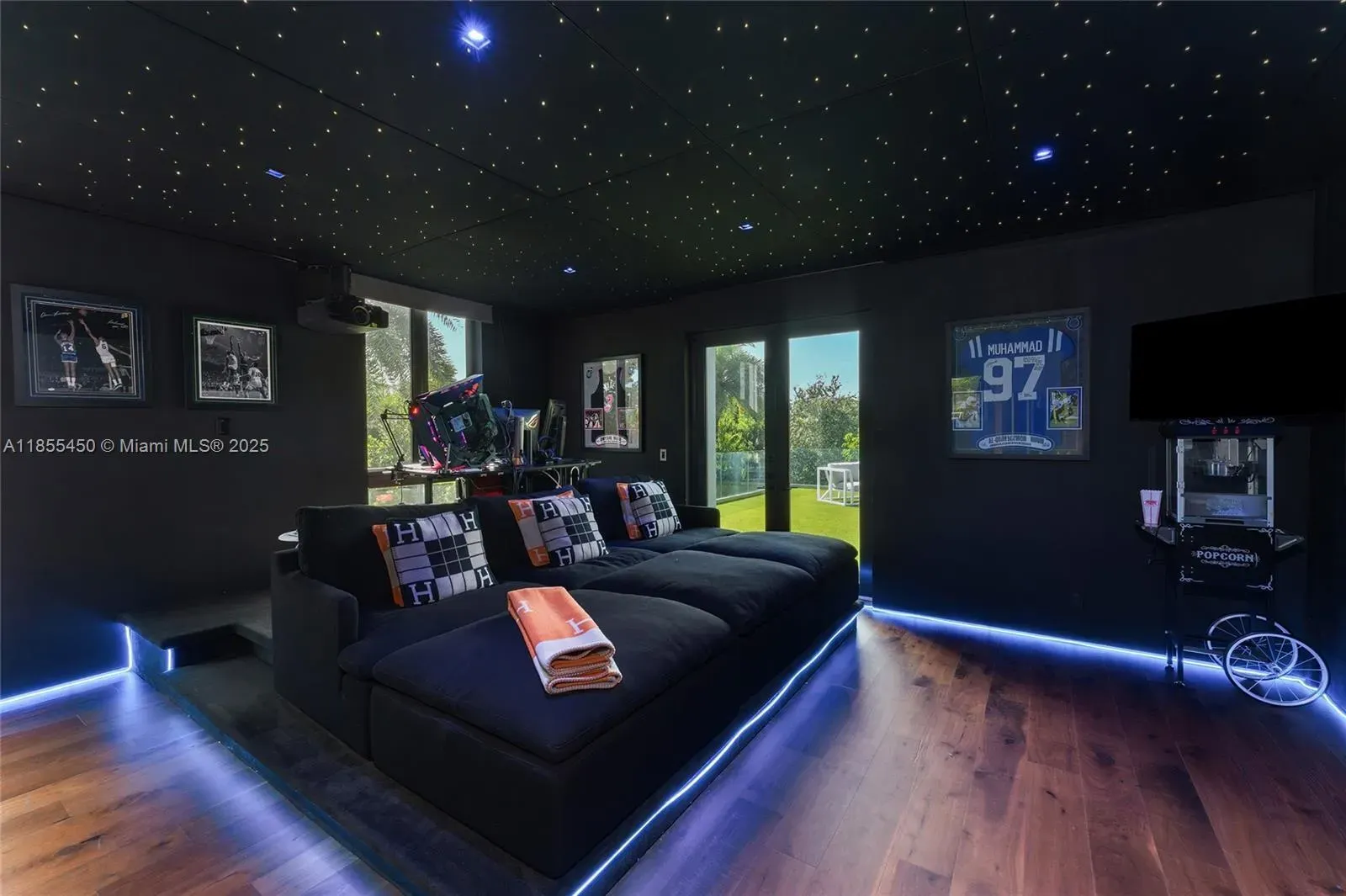 Media room goes full blackout with star ceiling. Cozy cave vibes.