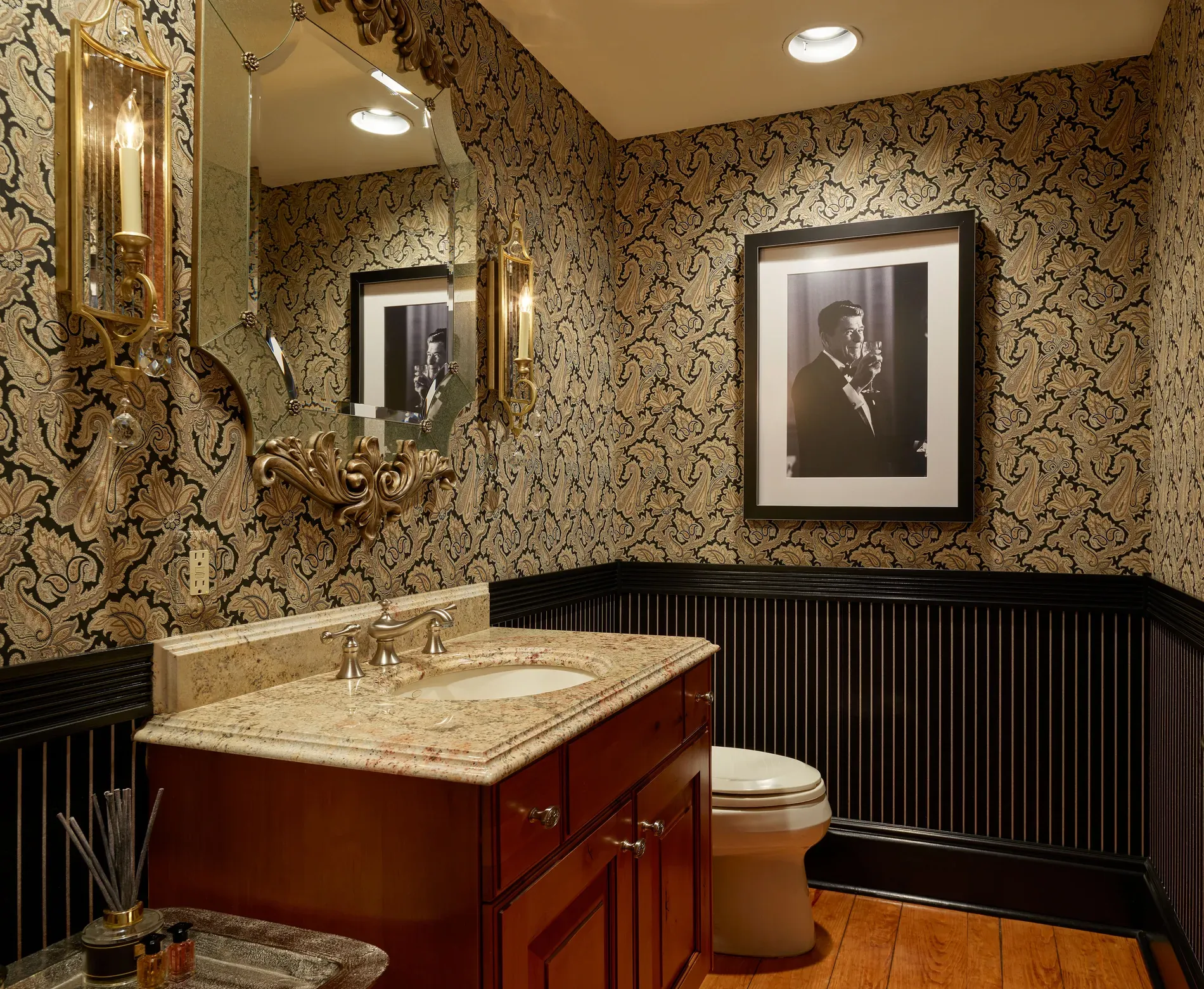Powder room went full drama. damask walls, dark wainscoting. Not sure together?