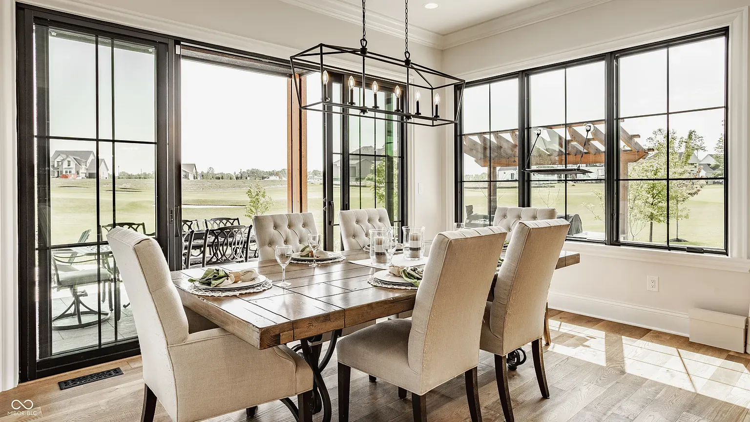 Big wood table, soft chairs. Feels long dinners actually happen.