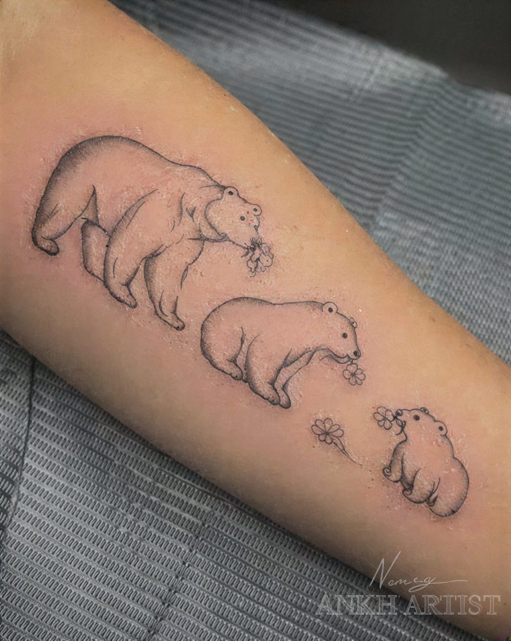 Mama bear with her cubs