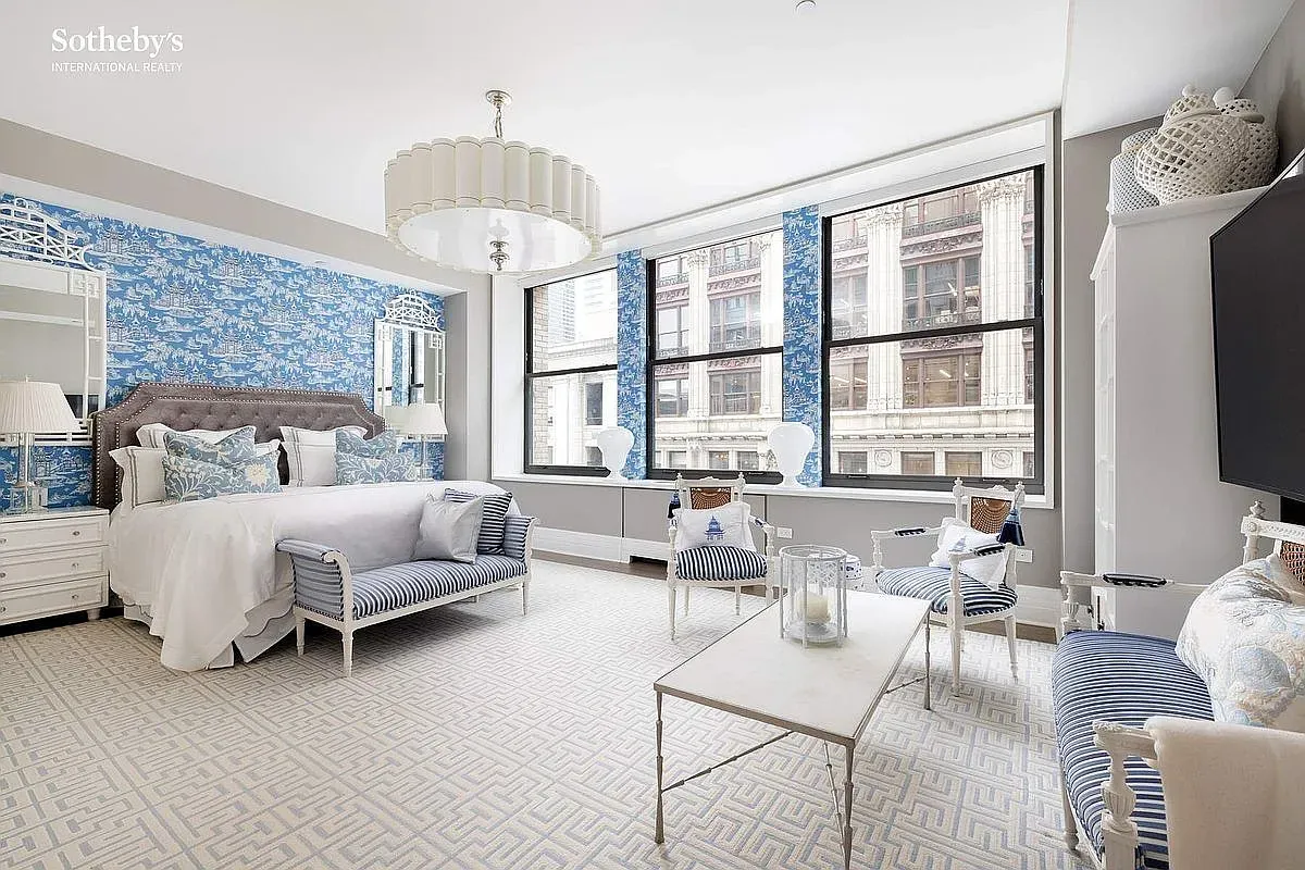 Blue floral bedroom, lots of daylight. Fresh, a little preppy, very calm.