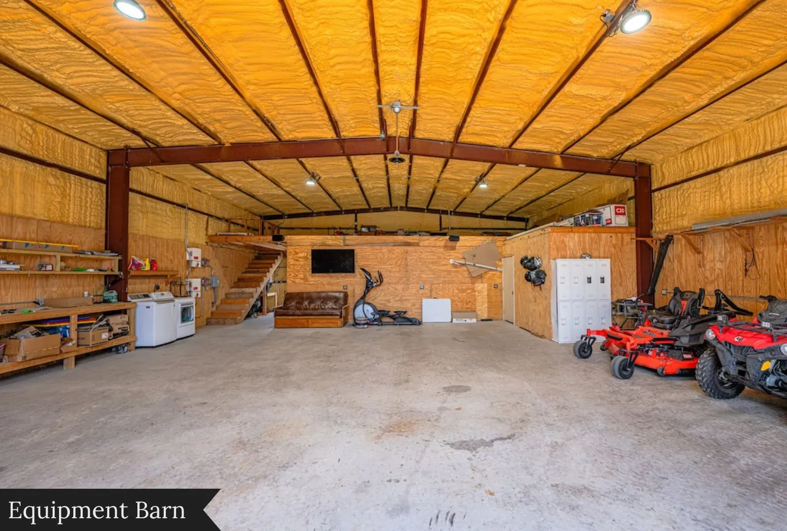 Equipment barn time — yellow insulation pop, steel ribs, very tidy. Seven million tidy?