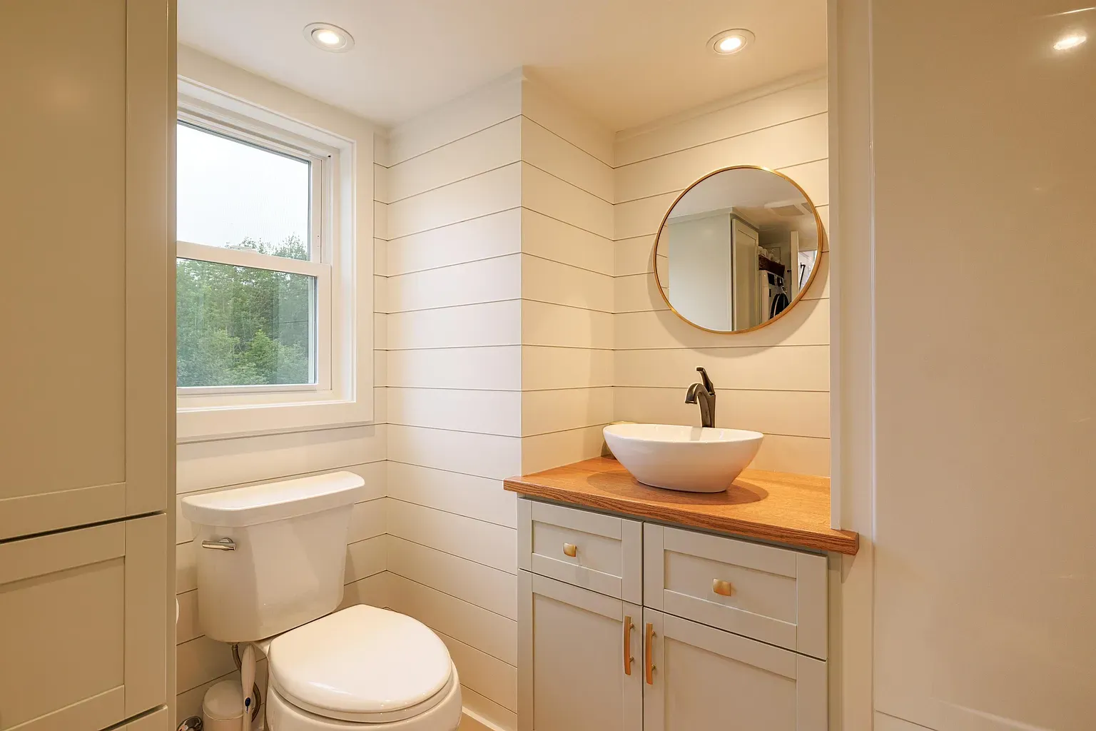 Light gray shiplap makes it calm. Simple, clean, zero drama.