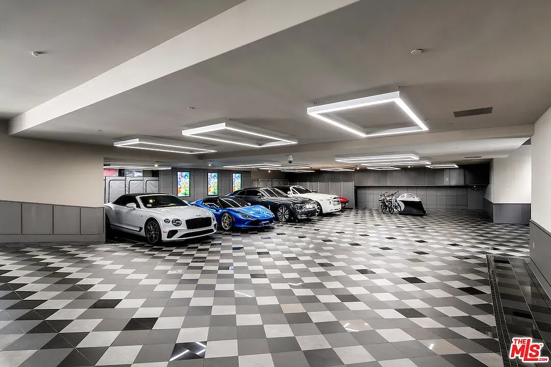 Garage went race-ready—checkerboard floor, bright LEDs. Where are the toys parked?