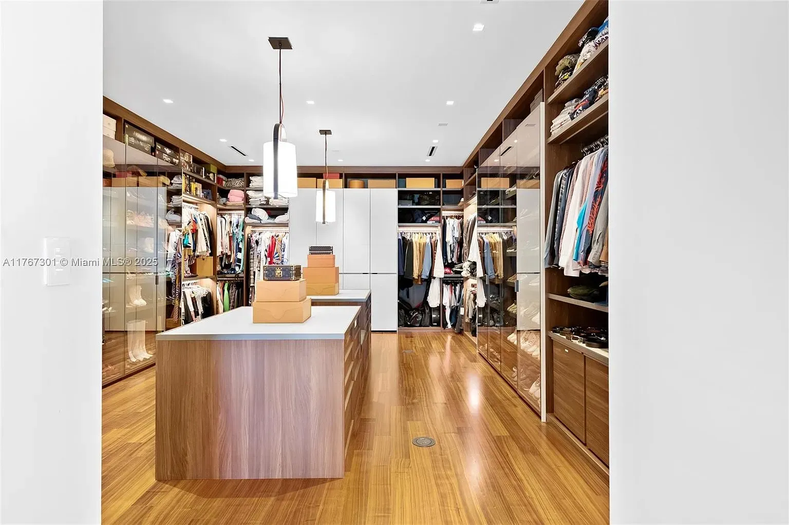The closet is basically a boutique. Rich wood, everything has a spot.