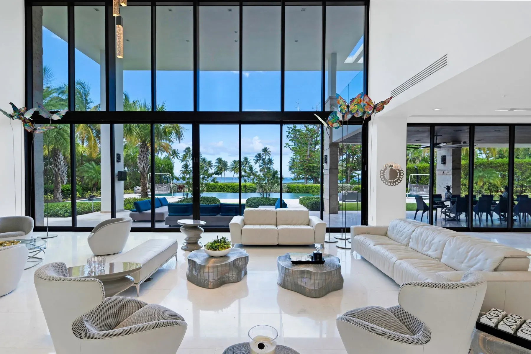 Living room basically a fishbowl, but in a good way. Water right there.