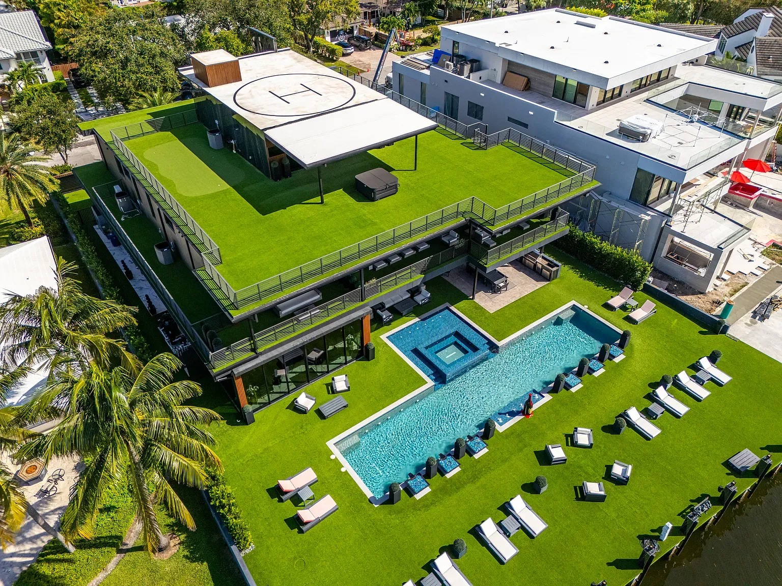 Casual helipad on the roof. Pool out back because why not.