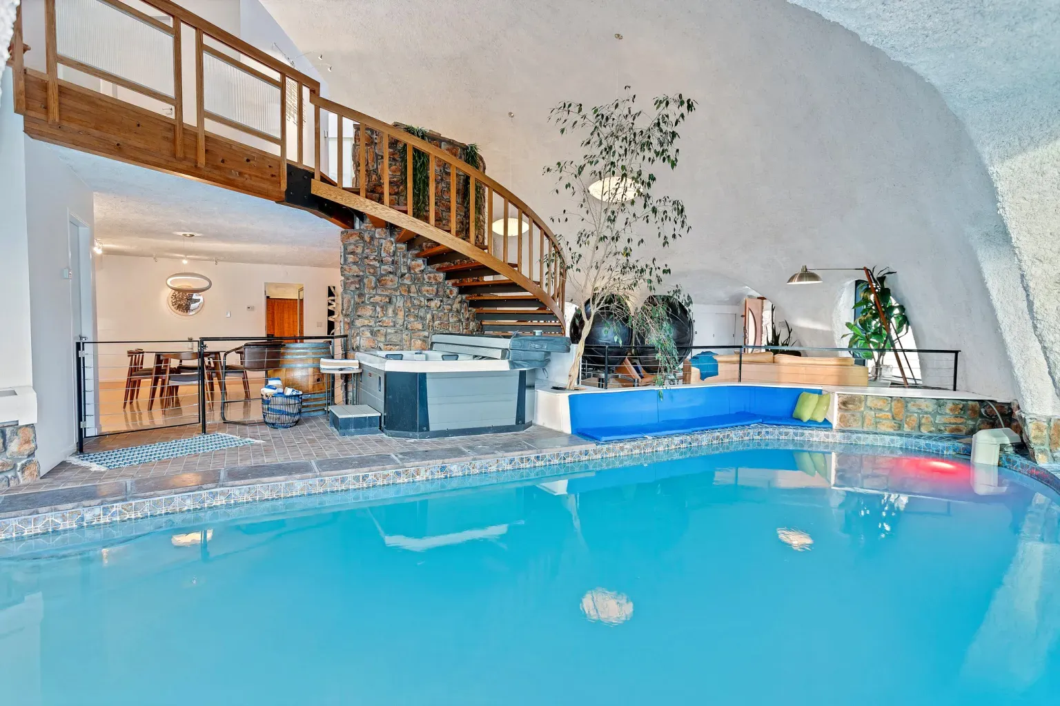 Surprise indoor pool, tucked under a creamy cave ceiling.