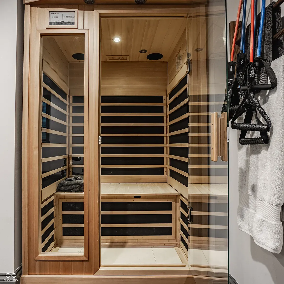 Sauna looks brand new. Warm wood with black accents, very sleek.