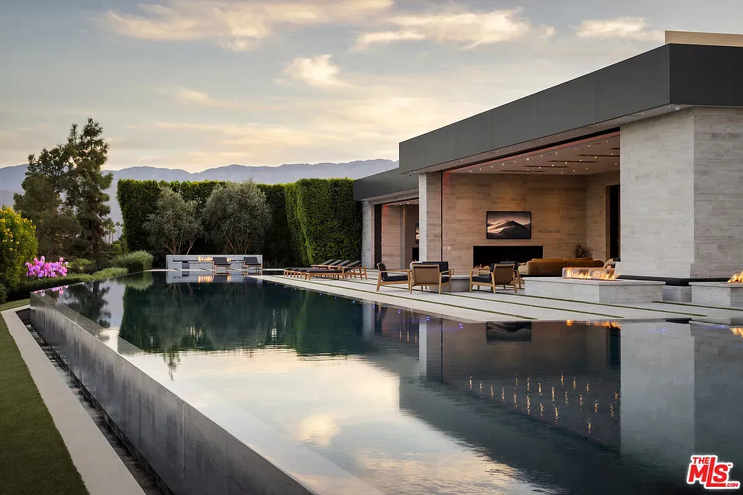 Infinity edge straight into the sky. Sunset reflections are doing the most.