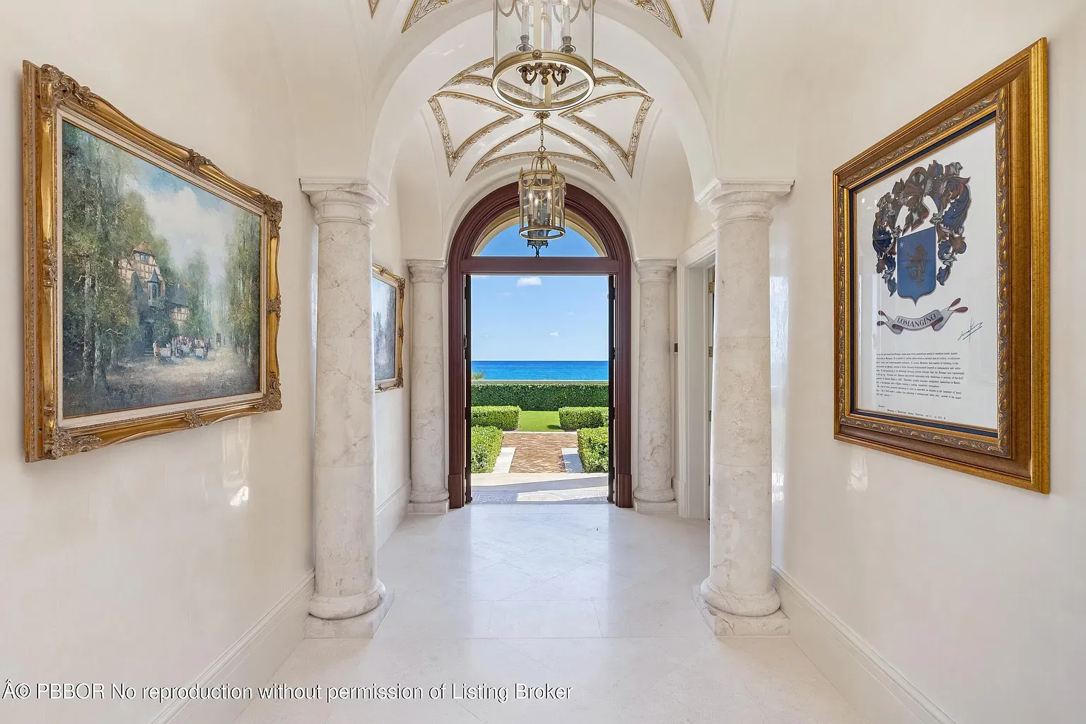 Here’s the entry—marble floors, arched doorway, columns. Kinda museum energy.