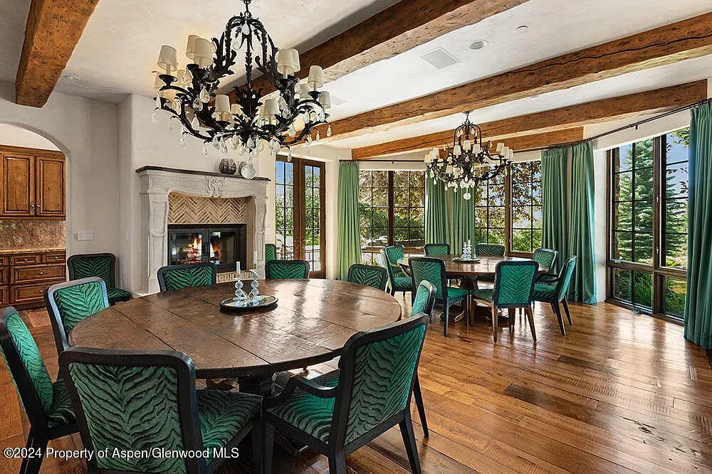 That chunky wood dining table steals it. Chairs look ridiculously comfy.