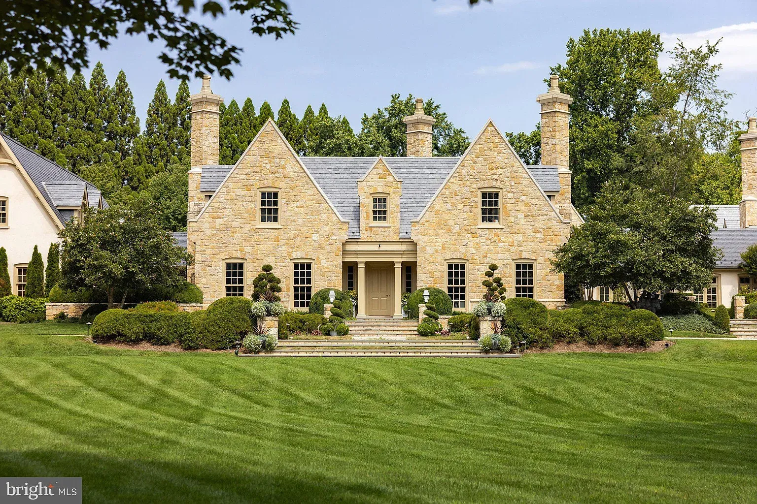 Here's the front—gold stone and greenery. Fancy but kinda cozy.