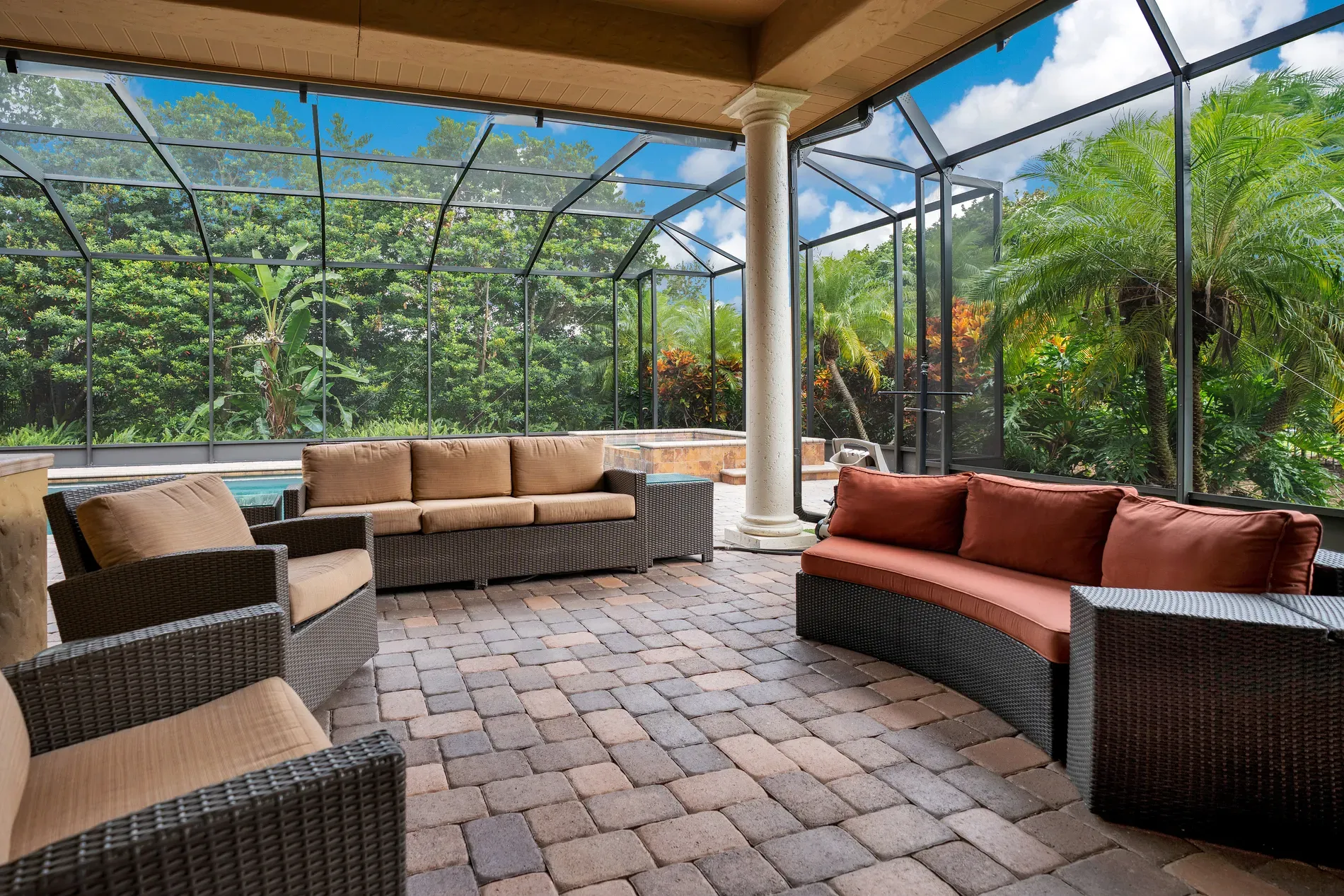 Screened patio with warm pavers. Breezy hangout, bug-free, thank you.