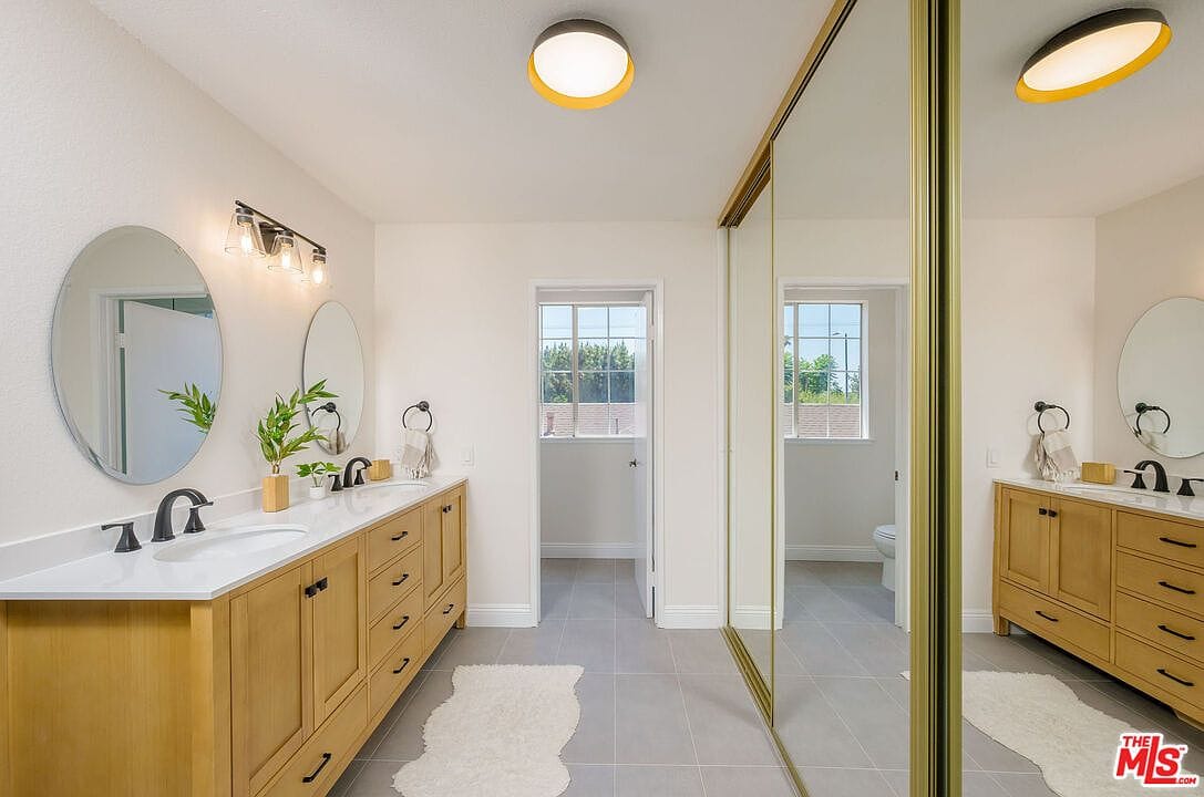 Opposite view of the primary bathroom vanity area