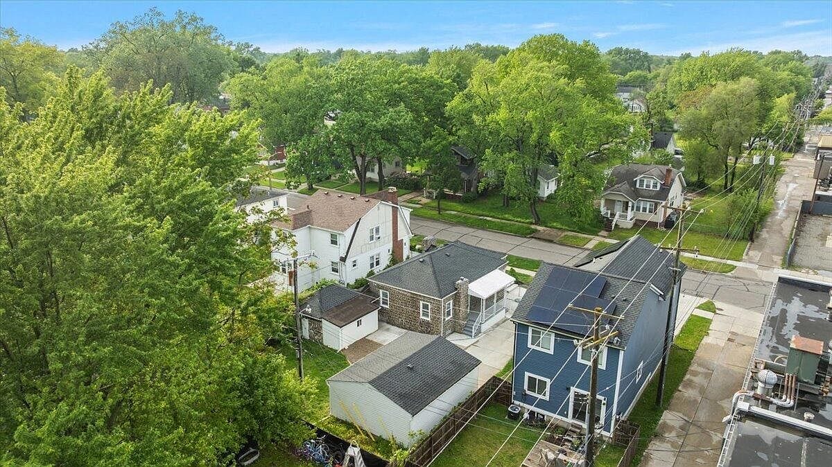 Aerial view of the backyard and neighbors