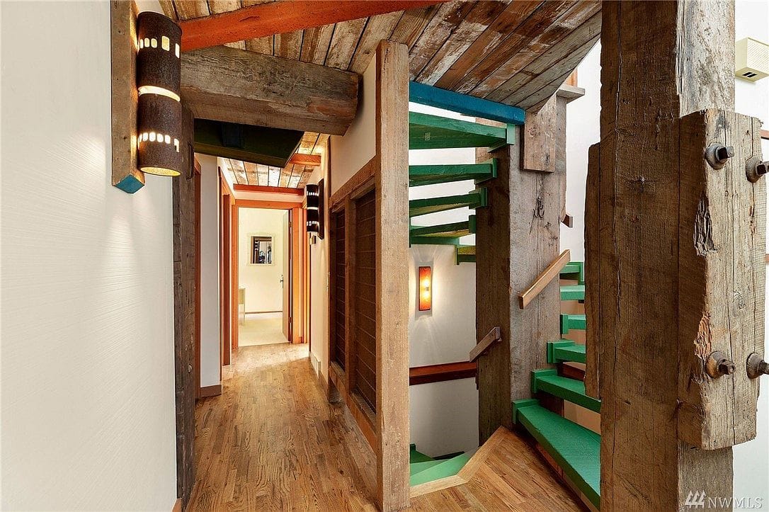 Wood beams, green stairs
