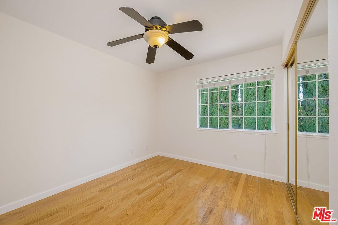 Upstairs bedroom looking toward the rear window