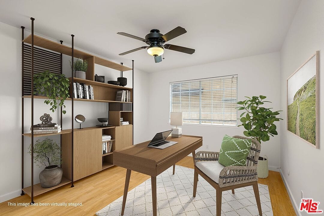 Downstairs bedroom staged as a home office