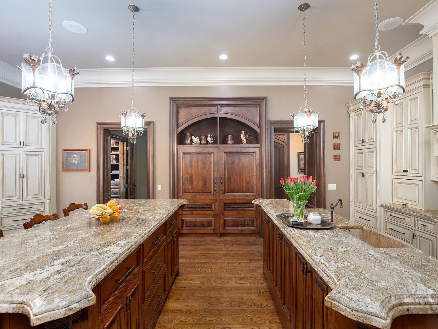 The view looking down the center of the double kitchen islands