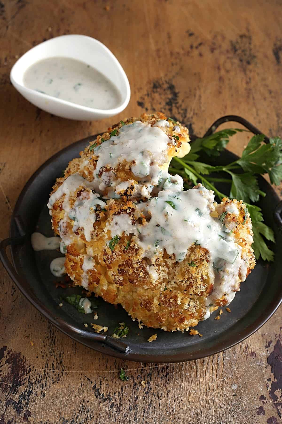 Whole Roasted Cauliflower with Parmesan Cream Sauce