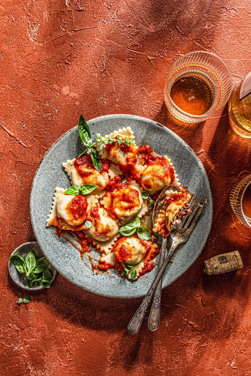 goat cheese and sun dried tomato ravioli with tomato sauce