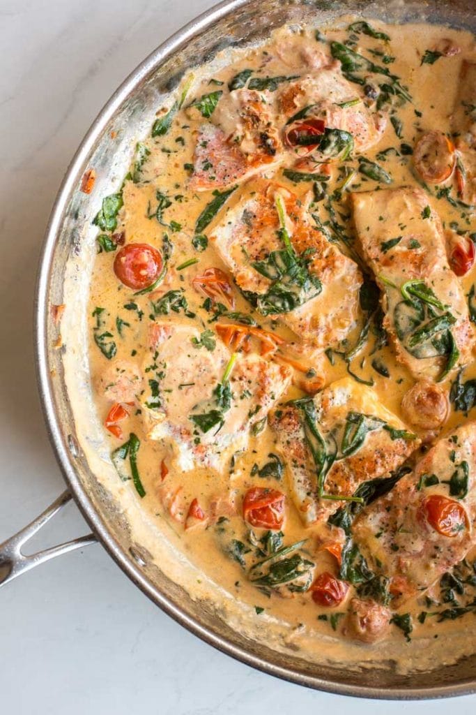 Pan-Seared Salmon with Creamy Spinach and Tomatoes