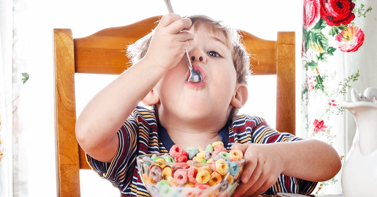 person eating sugary cereal