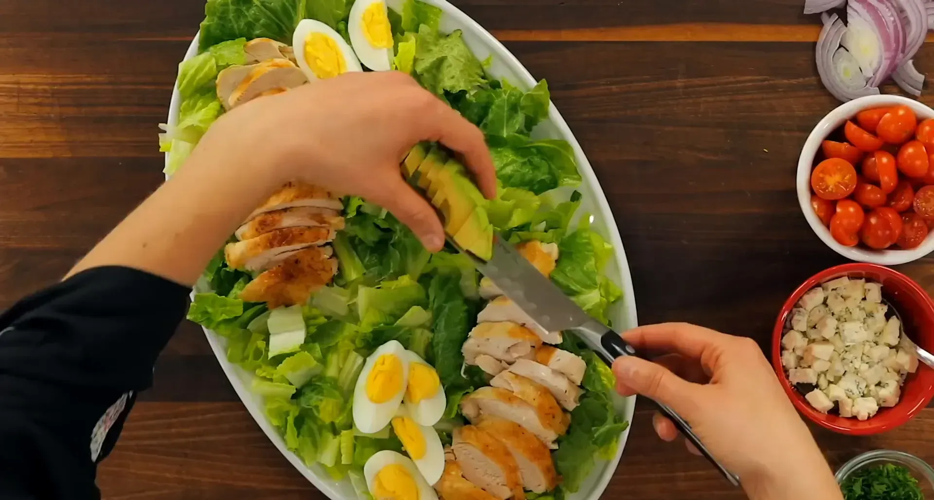 Avocado pieces arranged on the salad.