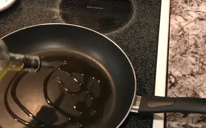 Heating oil in the skillet