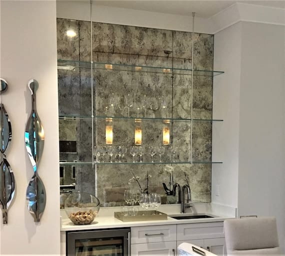 Bedroom wall with antique mirror tiles