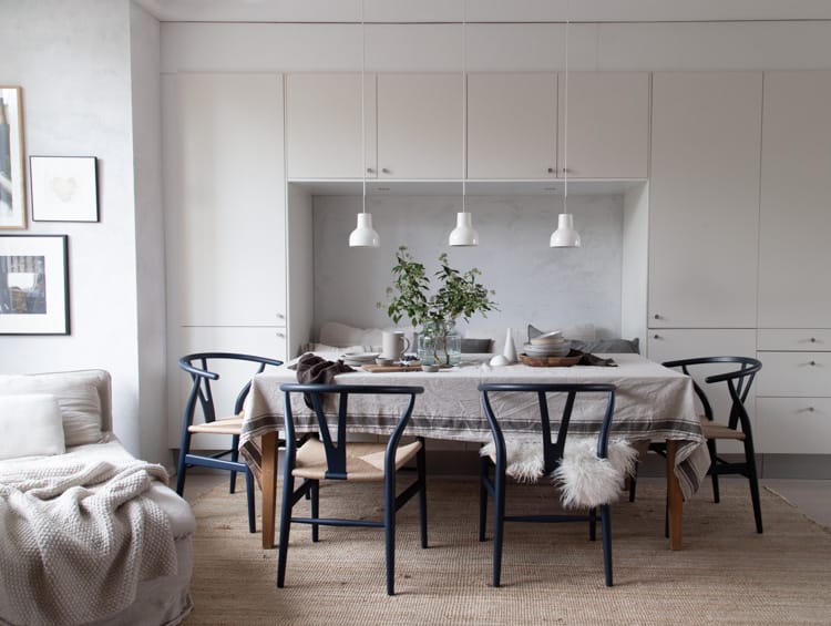 Add Wishbone Dining Chairs in the Dining Room