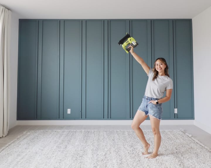 Bedroom wall with wood panel accent
