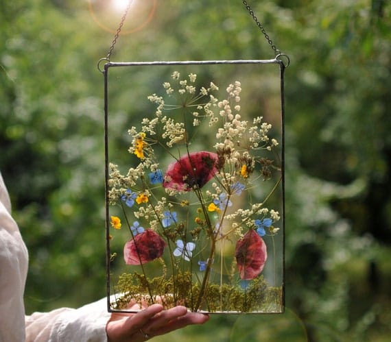 Bedroom wall with pressed flower frame