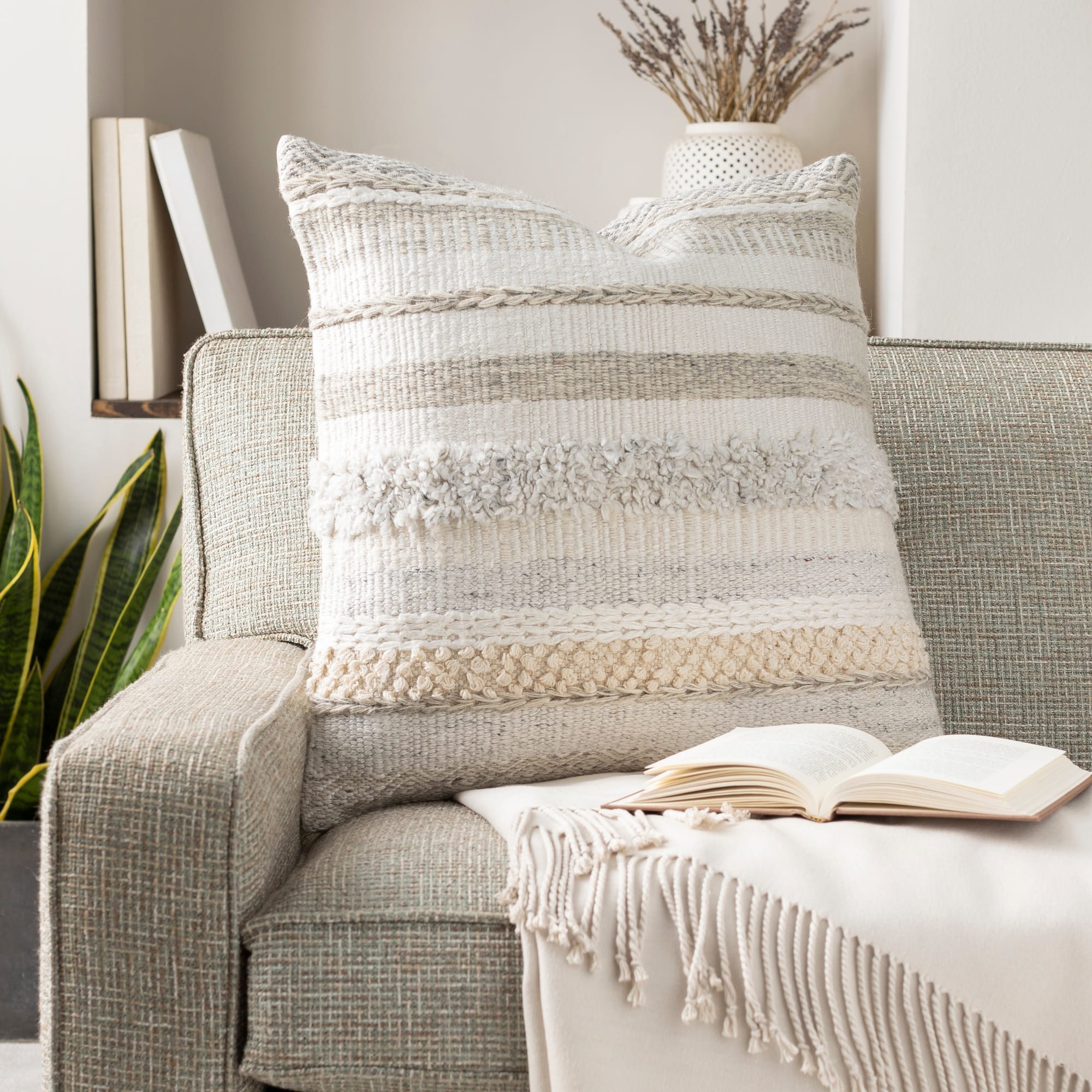 Cozy bedroom with wool throw pillows