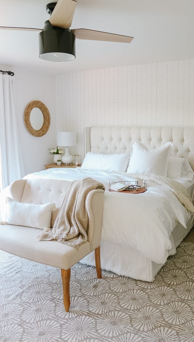 Cozy bedroom with textured wallpaper
