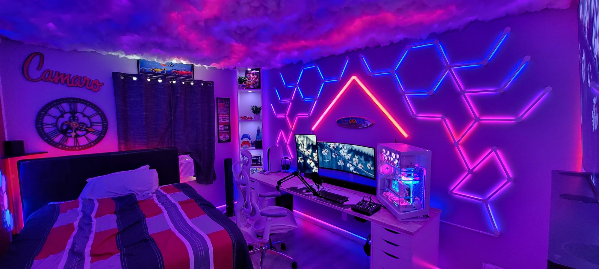 Large bedroom with gaming station setup