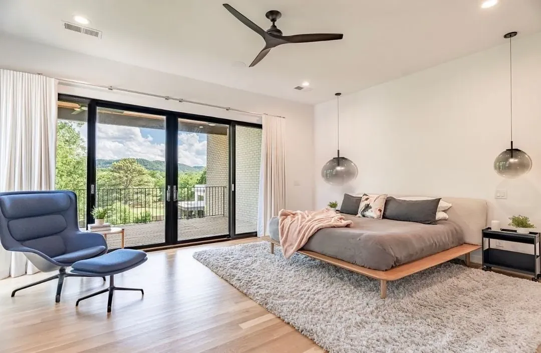 Add sliding doors to a small balcony in your master bedroom