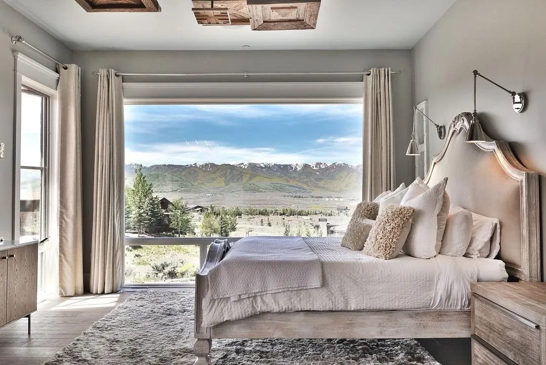 Large bedroom with window wall design