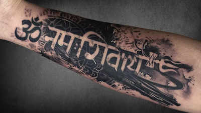 an Indian tattoo with Sanskrit script writing