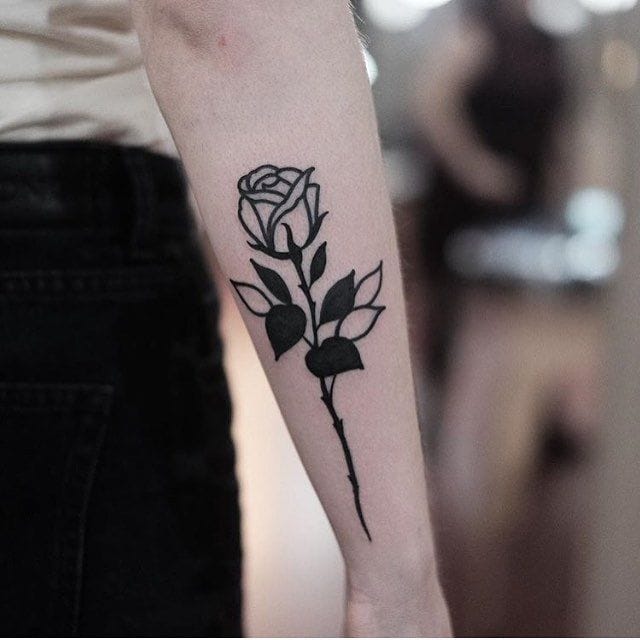 simple blackwork rose tattoo