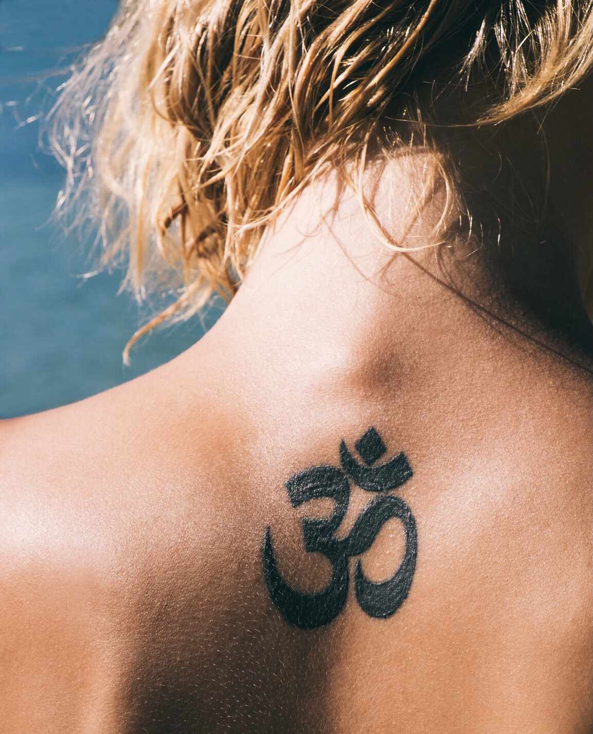 an Indian tattoo with the Om symbol
