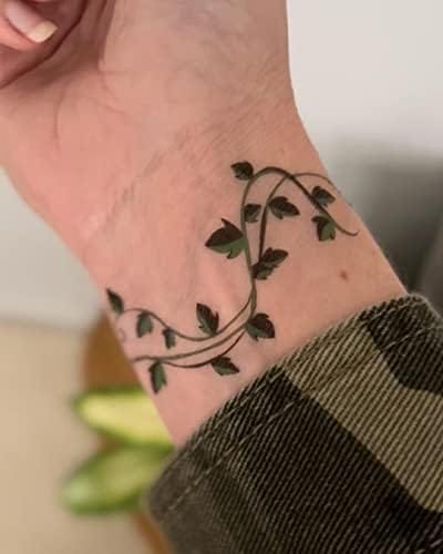 realistic style ivy tattoo