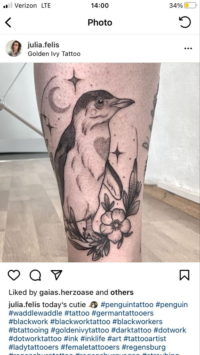 penguin with flower tattoo